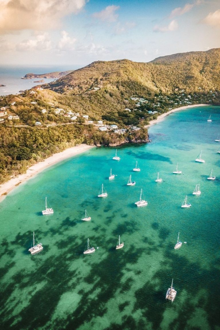 Aerial view of Bequia surrounded by sailboats