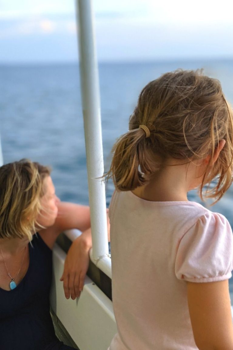 Mom and daughter gazing out from ferry to Bequia (Caribbean)