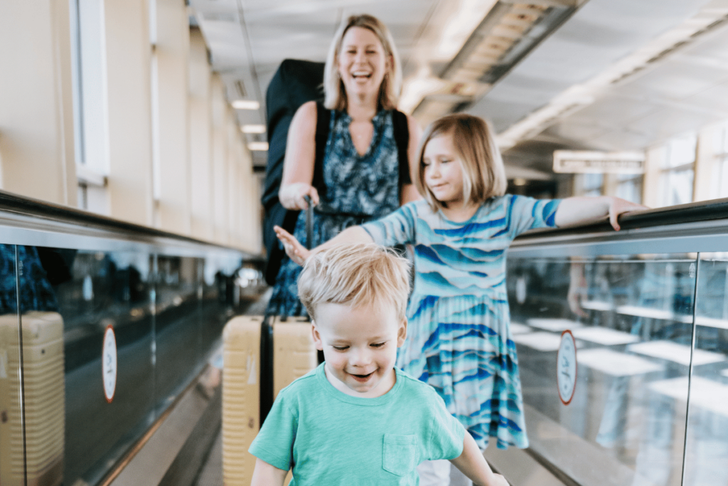 Happy family traveling at airport